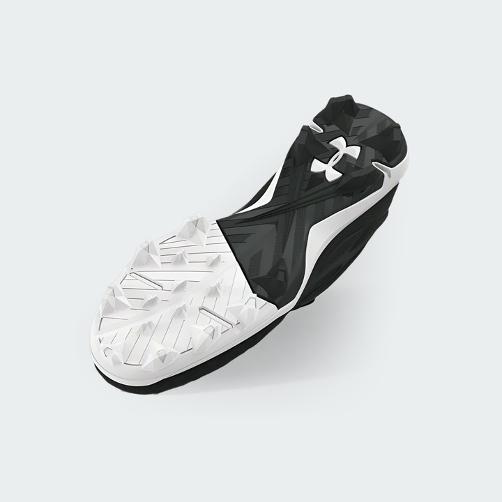 Under Armour Leadoff Low black and white baseball shoe, bottom view of sole and cleats